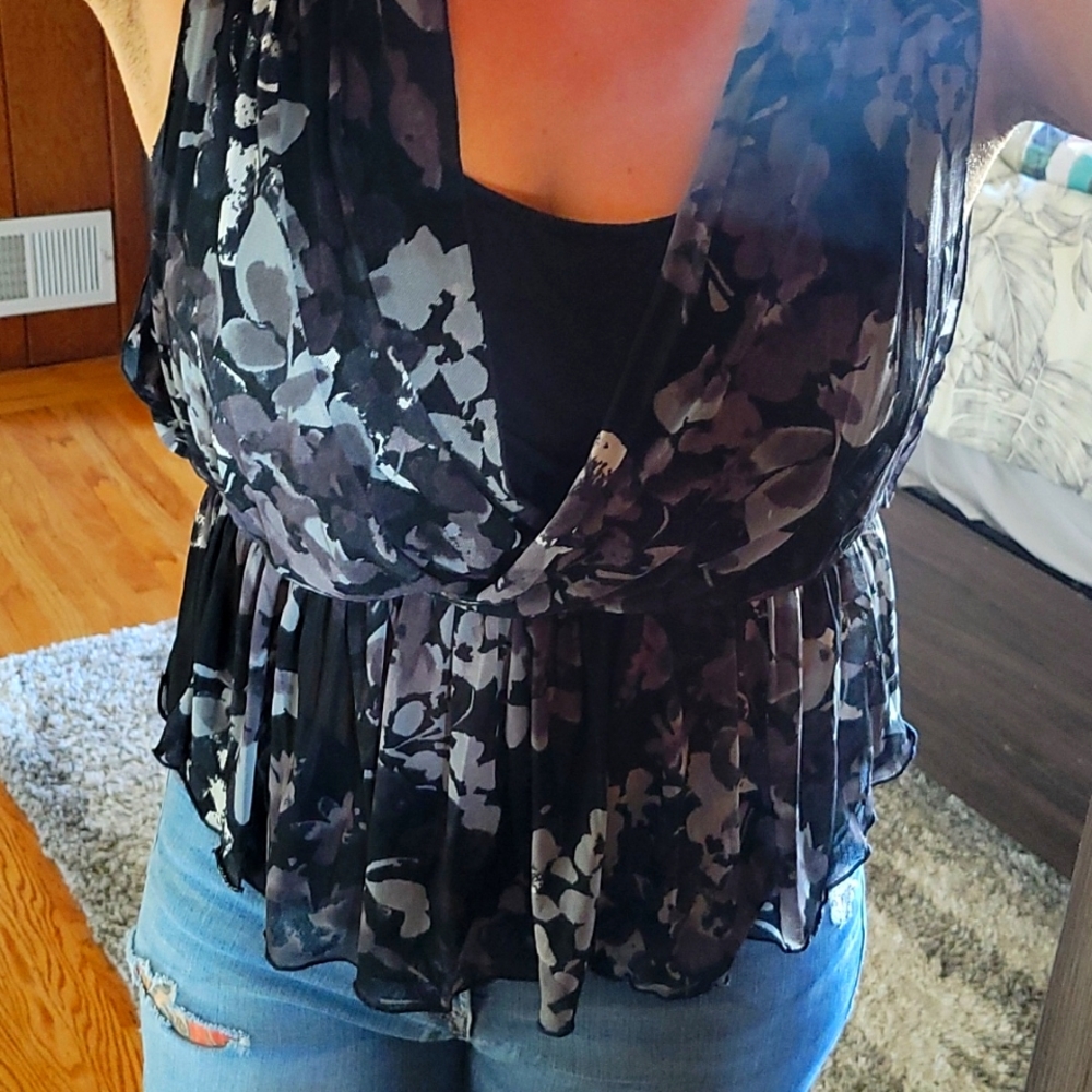 Express Peplum Black Mesh Top with floral print.